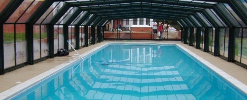 Outdoor pool cover with canopy