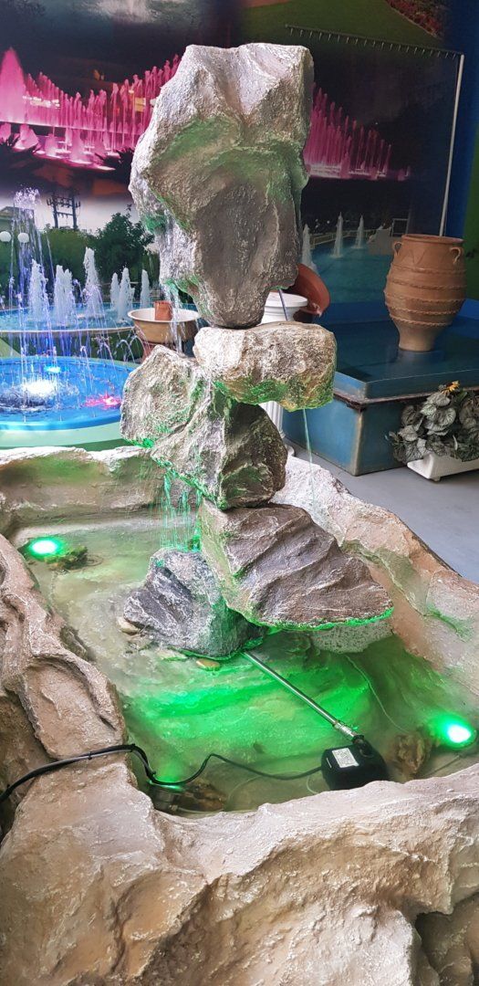WATERFALL WF008 Polyester Fountain Rock Garden Waterfall with monochrome or RGB Lighting. Length: 2m Width: 1m Height: 1.60m Can be made to any size.